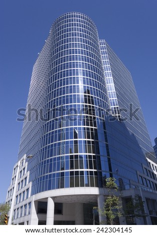 VANCOUVER, CANADA - AUGUST 6, 2005: Pan Pacific Hotel in Downtown Vancouver  against a blue sky