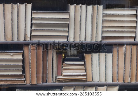 Old Books - Behind dirty glass in Saint Malo, Brittany, France