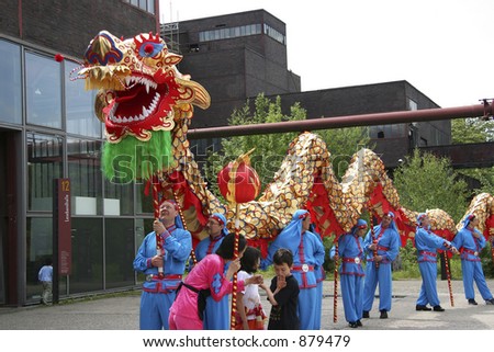 dragon-dance - performers with the dragon in a row