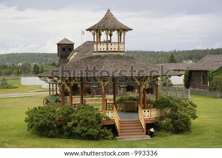 vintage scenery with an ancient pavilion - wooden shingles on the roof