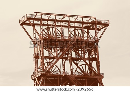 ancient shaft tower - coal mine consol, gelsenkirchen, built 1922, closed 1997 - sepia toned
