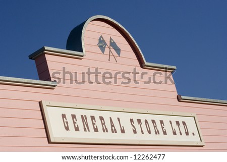 store sign - commercial sign on a pink house