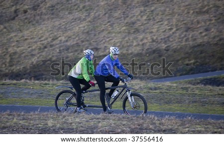 HERNE, GERMANY - JUNE 12: Paul and Emma Becker win the 8th Tandem Bike Race over a distance of 100km through Northrhine-Westfalia on June 12, 2009 in Herten, Germany