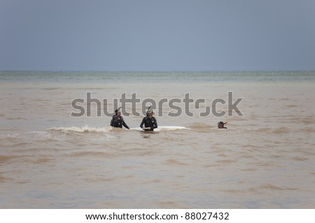 OLYMPOS, TURKEY - OCTOBER 14: Frogmen doing rescue work after flood disaster on October 14, 2009 in Olympos, Turkey. The floods swept away about 50 cars and motorcycles from the road into the sea.