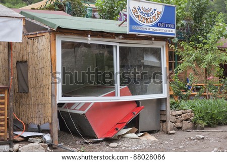 OLYMPOS, TURKEY - OCTOBER 14: Destroyed Fast Food Restaurant with overturned Counter after flood disaster on October 14, 2009 in Olympos, Turkey. The floods destroyed roads and houses.