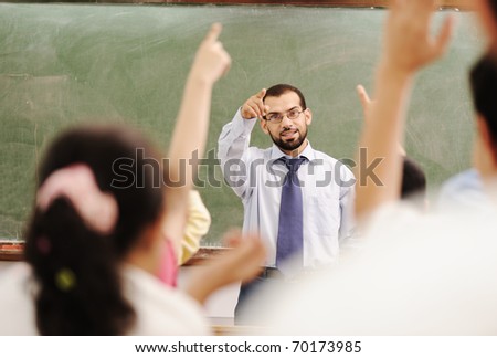 arabic kids in the school, classroom wit a teacher