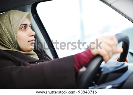 muslim woman in a car