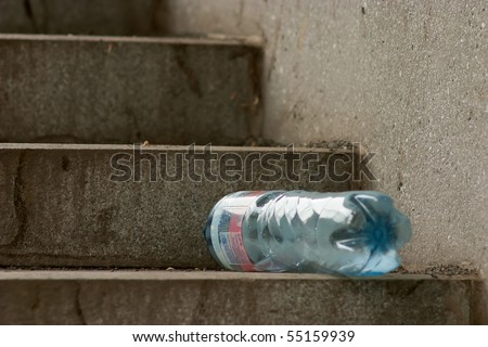 Polluted city series. Wasted PET bottle on stairs.