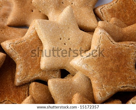 Horizontal photo of gourmet dog biscuits in shape of stars from specialty baker on sale at local market