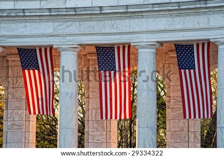 Easter Sunrise Service Arlington National Cemetery with sun streaming through US flags