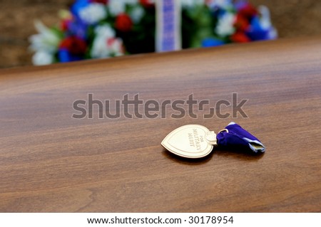 Arlington National Cemetery with Purple Heart metal on top of casket prior to burial