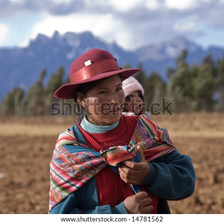 Peru - August 1: A Native Peruvian Women And Baby Demonstrates How To ...