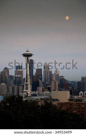 Classic Skyline of Seattle at Sundown from Queen Anne Neighborhood from Kerry Park with Full Moon