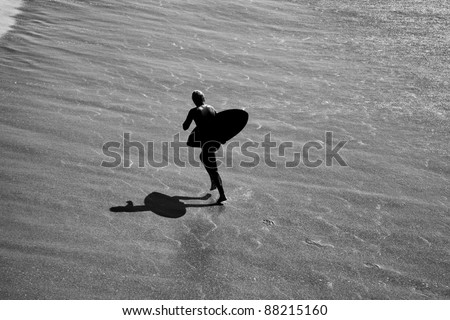 Black and White Silhouette  of Wave Boarder in Surf Newport Beach California