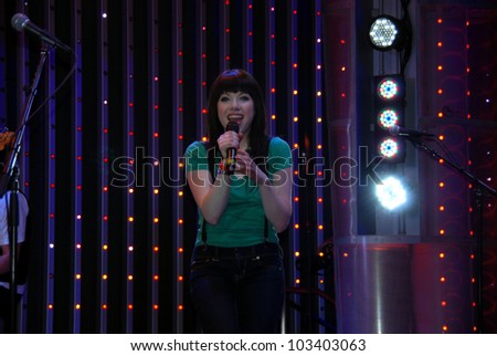 UNIVERSAL CITY, CA-APRIL 14: Singer Carly Rae Jepsen performs at Universal Citywalk 5 Towers Stage to promote her CD single \