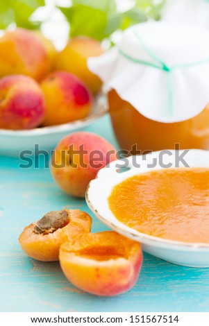 fresh apricots and apricot jam, still life