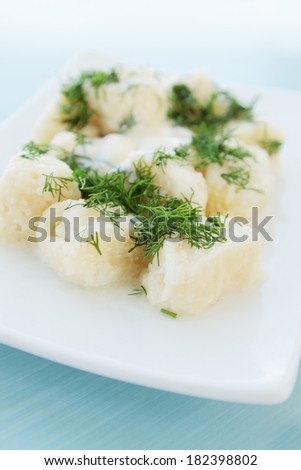 lazy dumplings with dill and sour cream