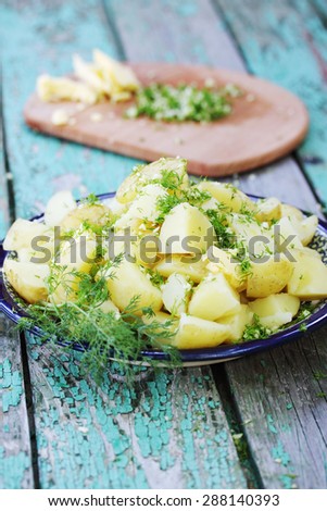 Boiled potatoes with butter and dill house