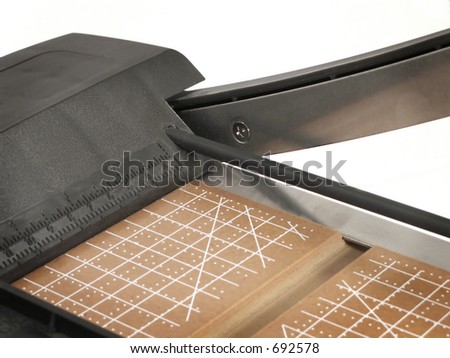 Cutting  blade up and ready to slice, isolated against white background.
