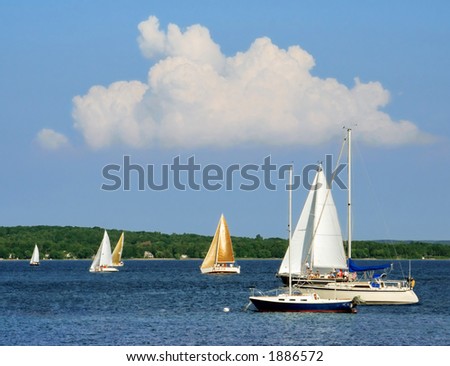 Sailboats on the blue water of Grand Traverse Bay, Michigan