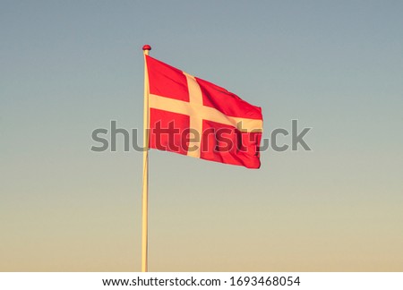 Similar – Image, Stock Photo Danish flag at dawn waving in the wind