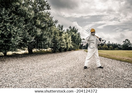 Worker protecting a road