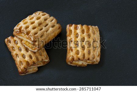 cookies, gingerbread with honey pastries against a dark background. Light breakfast, pleasant awakening