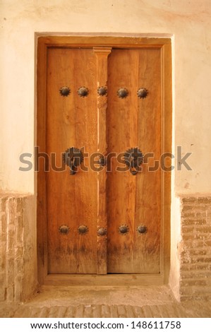 Traditional old home door in Kashan, Iran.