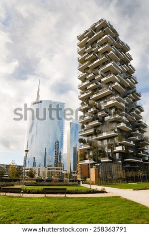 Milan, Italy - 2014, November 16 : The Unicredit tower and Vertical Forest apartment building in the Porta Nuova district of Milan, Lombardy, Italy