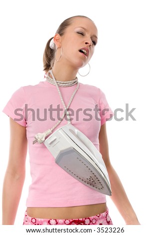 tired young woman with cord from electric iron around her neck