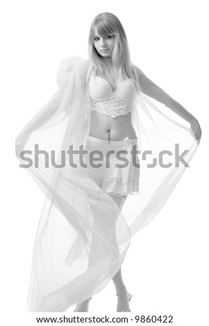 young pretty woman in white sexy underwear and fairy transparent cloak