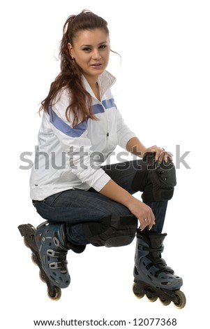 young smiling woman in roller blades isolated on white
