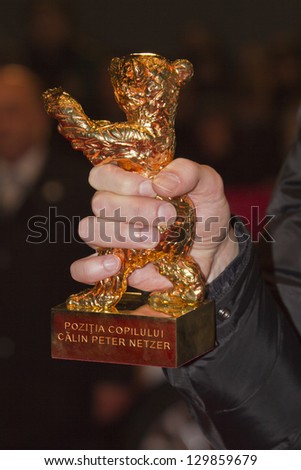BERLIN, GERMANY - FEBRUARY 16: Calin Peter Netzer and Golden Bear  attend the Closing Ceremony At The 63rd Berlinale Festival at Palast on February 16, 2013 in Berlin, Germany.