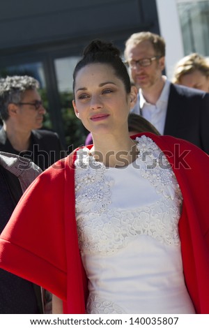 CANNES, FRANCE - MAY 24: Marion Cotillard attends the photocall for \'The Immigrant\' at The 66th Annual Cannes Film Festival on May 24, 2013 in Cannes, France.
