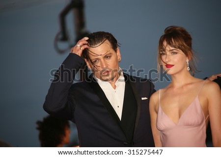 Johnny Depp andDakota Johnson  attend the premiere of the movie \'BLACK MASS\' during the 72nd Venice Film Festival on September 4, 2015 in Venice, Italy.