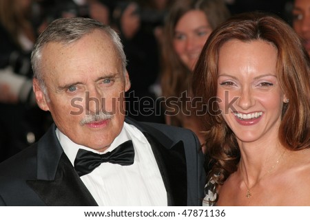 CANNES, FRANCE - MAY 11: Dennis Hopper with his wife attend the 58th Cannes Film Festival  premiere of opening film \'Lemming\'at the Grand Theatre Lumiere on May 11, 2005 in Cannes, France