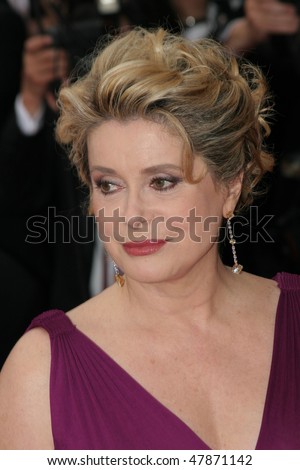 CANNES, FRANCE - MAY 11: Catherine Deneuve attends the 58th Cannes Film Festival Opening Ceremony and premiere of opening film \'Lemming\'at the Grand Theatre Lumiere on May 11, 2005 in Cannes, France