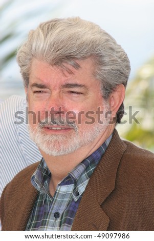 CANNES, FRANCE - MAY 15: George Lucas attends a photocall promoting the film \'Star Wars Episode III\' at the Palais during the 58th  Cannes Film Festival on May 15, 2005 in Cannes, France