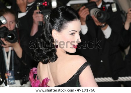 CANNES, FRANCE - MAY 21: Dita Von Teese  attends the \'Over The Hedge\' premiere at the Palais Des Festivals during the 59th International Cannes Film Festival May 21, 2006 in Cannes, France