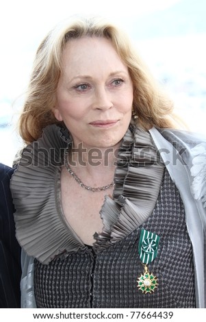 CANNES, FRANCE - MAY 15: Faye Dunaway  receives the Order Of Arts And Letters Medal at Cafe des Palmes during the 64th Cannes Film Festival on May 15, 2011 in Cannes, France