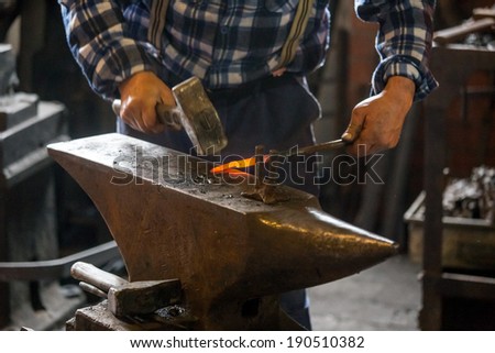 Similar – Image, Stock Photo Blacksmith hands forging molten metal on anvil