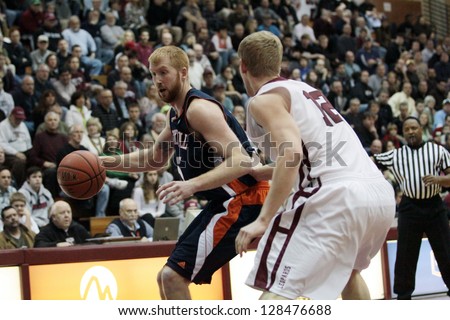 EASTON, PA - FEB 16: BucknellÃ¢Â?Â?s Joe Willman #15 drives to the basket during a game against Lafayette at the Kirby Sports Center February 16, 2013 in Easton, PA