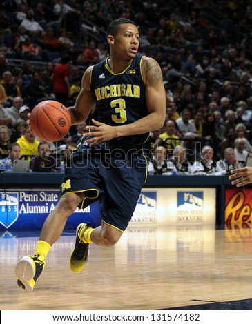 UNIVERSITY PARK, PA - FEBRUARY 27: Michigan\'s Trey Burke drives to the basket against Penn State  at the Byrce Jordan Center February 27, 2013 in University Park, PA