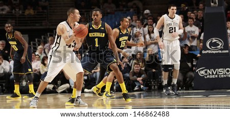 UNIVERSITY PARK, PA - FEBRUARY 27:  Penn State\'s Ross Travis passes the basketball against Michigan at the Byrce Jordan Center February 27, 2013 in University Park, PA