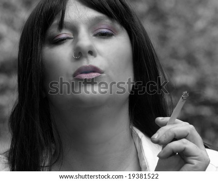 Black and white smoker, selective color, nose ring piercings