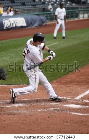 PITTSBURGH - SEPTEMBER 24 :  Andy LaRoche of Pittsburgh Pirates swings  at a  pitch against the Cincinnati Reds on September 24, 2009 in Pittsburgh, PA.