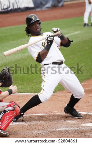 PITTSBURGH - SEPTEMBER 24 : Lastings Miledge of the Pittsburgh Pirates backs up after an inside pitch against Cincinnati Reds on September 24, 2009 in Pittsburgh, PA.