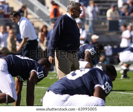 UNIVERSITY PARK, PA - OCT 9: Penn State's coach Joe Paterno watches his players warm up before a game against Illinois at Beaver Stadium October 9, 2010 in University Park, PA