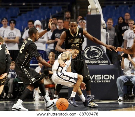 UNIVERSITY PARK, PA - JANUARY 5: Penn State's Talor Battle dribbles the ball and loses the handle against Purdue at the Byrce Jordan Center January 5, 2011 in University Park, PA