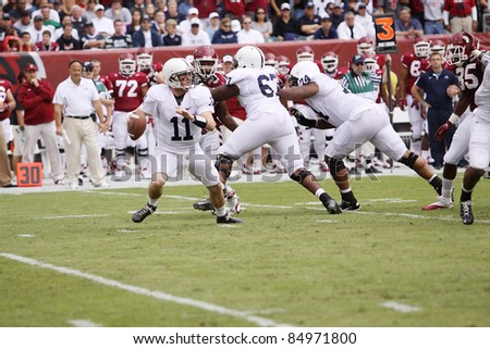 PHILADELPHIA, PA. - SEPTEMBER 17: Penn State Quarterback back Matthew McGloin is pressured by Temple\'s defense  on September 17, 2011 at Lincoln Financial Field in Philadelphia, PA.